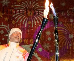 La fiamma olimpica in viaggio dallo stadio a piazza Vigo